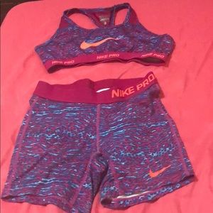 Pink blue Nike pro gym sports bra and shorts